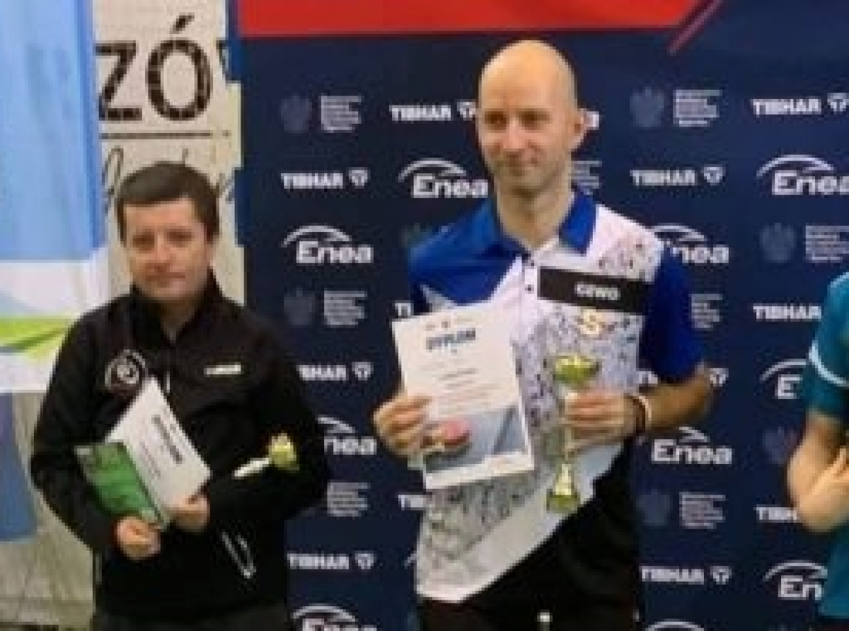 Tomasz Mika na podium